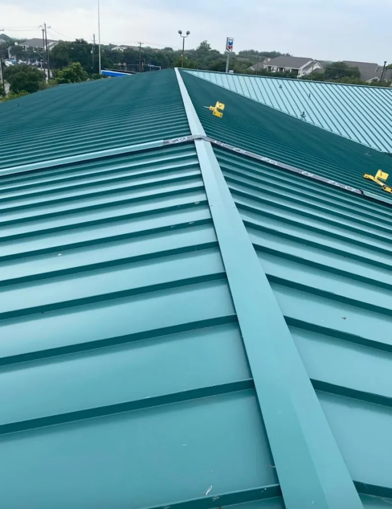 Green commercial metal roof ridge and valley for Metal Roof Repair in Milwaukie